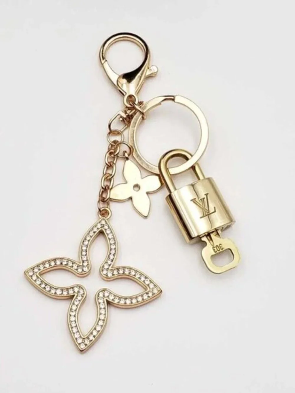 Authentic Louis Vuitton Gold Lock & Key 🔐 with unbranded Clover Bagcharm